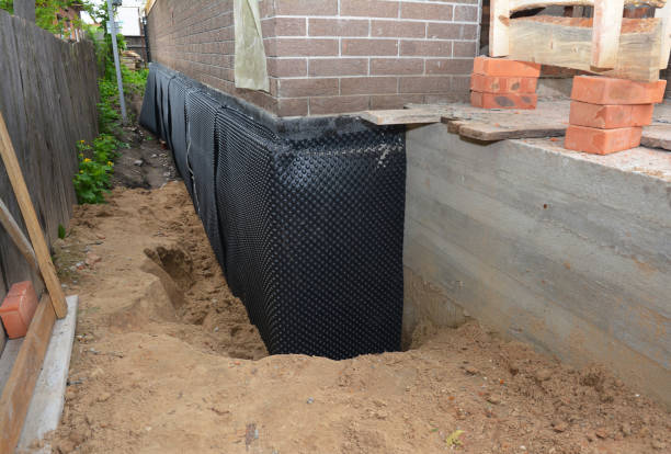 Happy homeowners after waterproofing job in Eastlake
